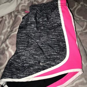 black white and pink nike shorts